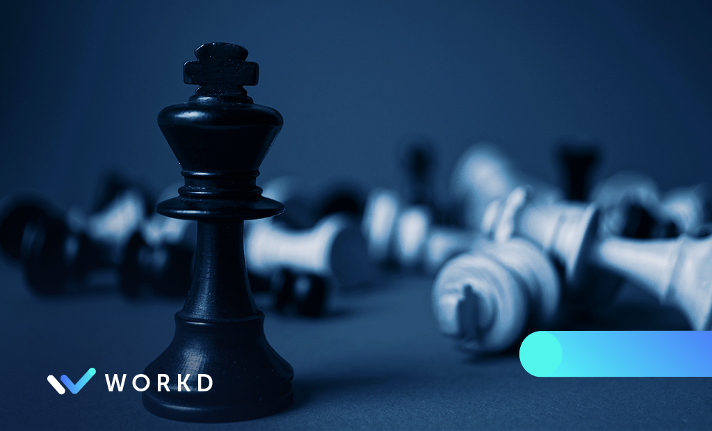 Chess pieces fallen over with the pawn standing